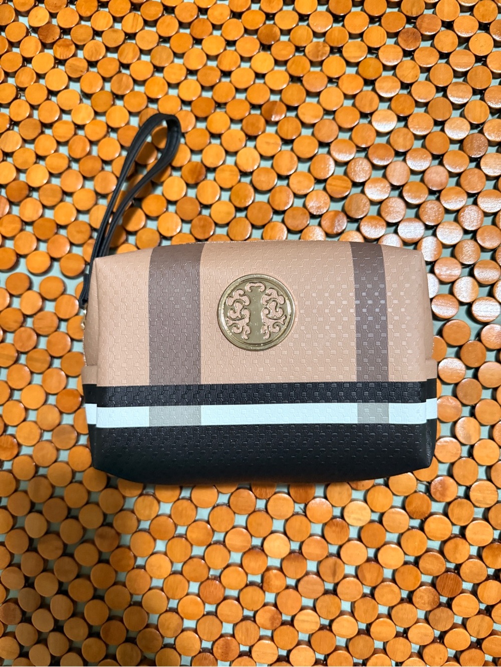 Striped Wristlet Clutch in Beige, Brown and Black with Round Emblem